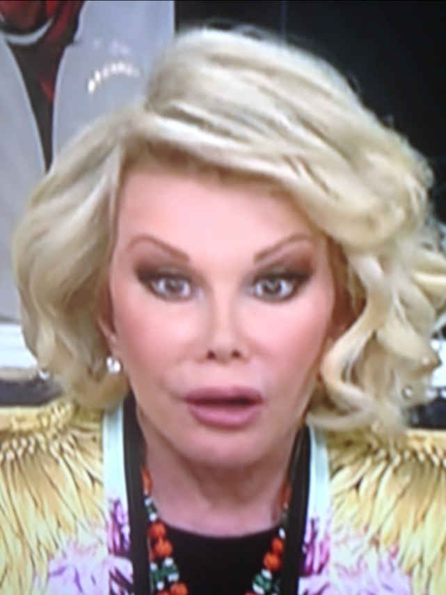 The face of Joan Rivers just appeared on E!'s Grammy Red Carpet show